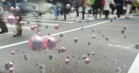 Busy urban street with digital virus particles overlay