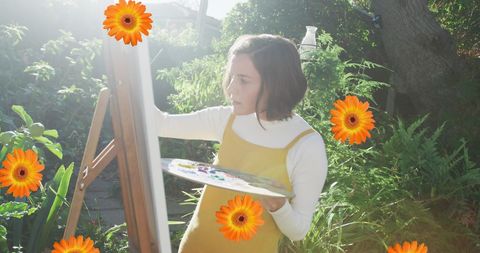 Artist in Garden Creating Bright Floral Imaginative Artwork