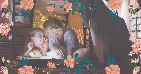 Playful Mother-Daughter Bond in Blanket Fort with Floral Design