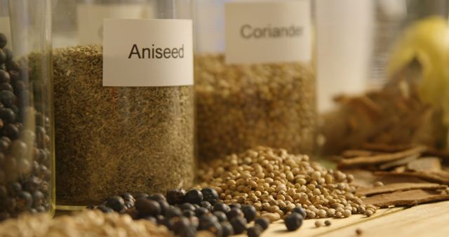 Assorted Spices in Jars and Loose on Wooden Surface - Download Free Stock Images Pikwizard.com