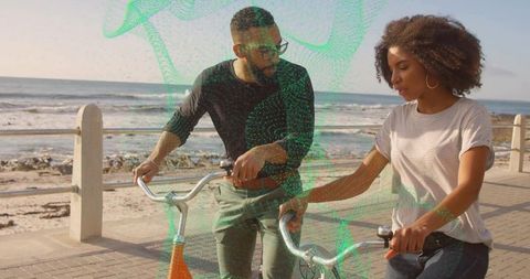 Friends Strolling with Bicycles Along Seaside Promenade