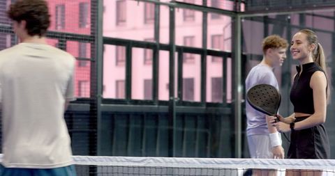 Friends Playing Padel Tennis Discovering Urban Fitness Fun