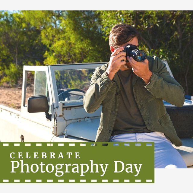 Young man taking photo with a camera, sitting on a jeep, outdoors with greenery in background. Use this for promoting Photography Day events, outdoor activities, or adventure travel.