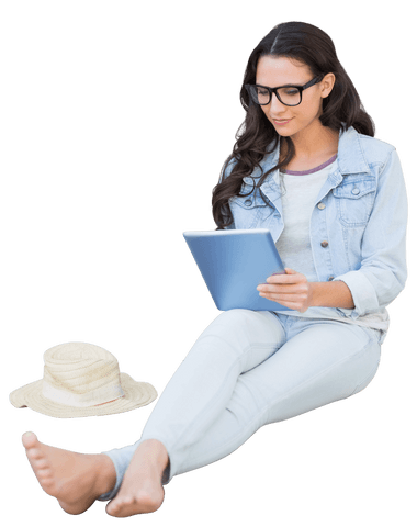 Young woman relaxing and using transparent tablet technology