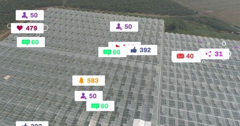 Social Media Icons Floating Over Solar Panels with Grassland