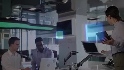 Modern Business Team Collaborating in Futuristic Office