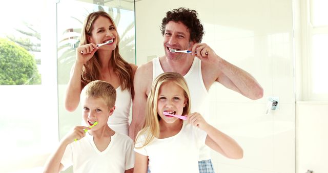 Happy Family Washing Teeth Together In Bathroom Celebrating Morning Routine - Download Free Stock Images Pikwizard.com