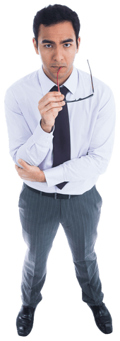Transparent serious businessman holding glasses