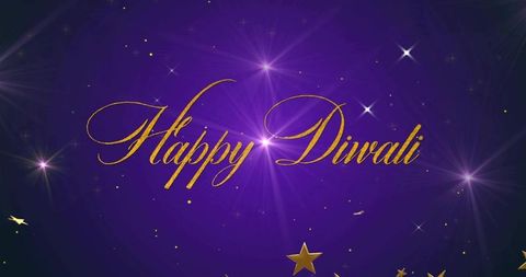 Golden happy diwali calligraphy radiating on purple starburst for festive luxury greeting