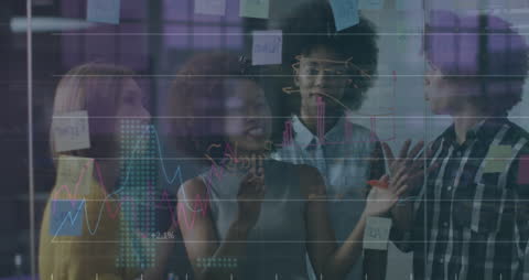 Collaborative Business Team Analyzing Financial Data Visualizations