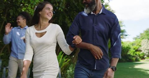 Joyful Friends Celebrating at Garden Wedding Party