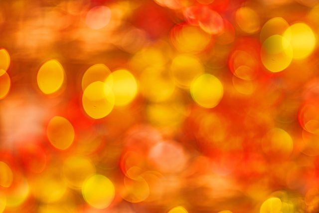 Abstract Background with Orange and Yellow Bokeh Lights - Download Free Stock Photos Pikwizard.com
