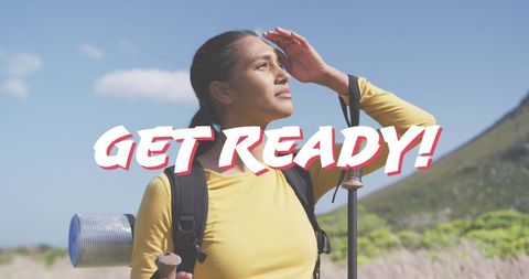 Woman Hiking through Scenic Mountain Trail