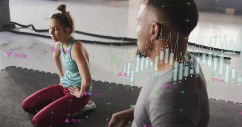 Kneeling woman catching breath after workout with trainer and fitness data overlay