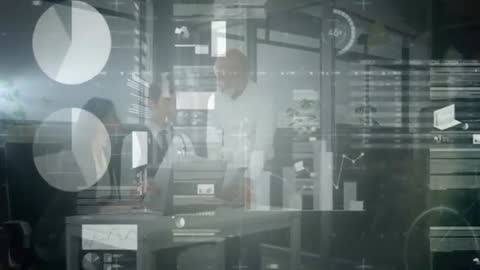 Diverse Team Analyzing Digital Charts During Corporate Meeting