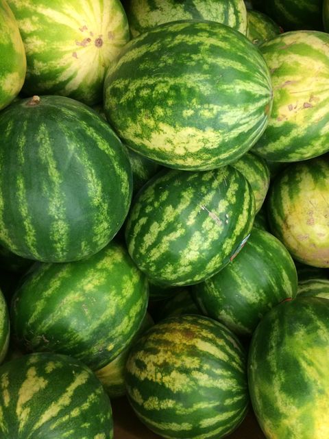 Fresh Watermelons Piled Together at Market - Download Free Stock Photos Pikwizard.com