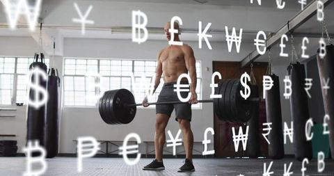 Shirtless athlete deadlifting heavy barbell in gym with floating currency symbols