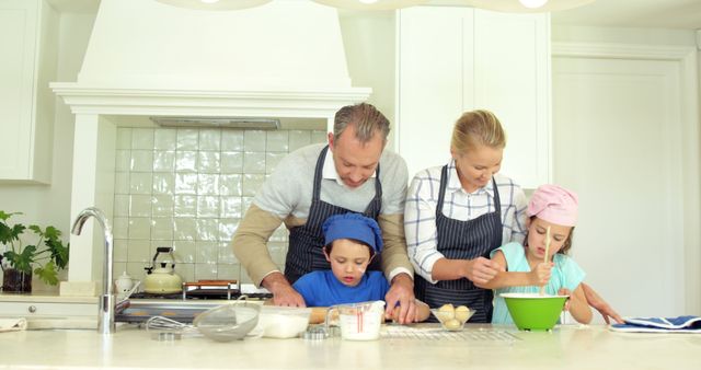 Family Baking Together in Kitchen, Teaching Cooking Skills - Download Free Stock Images Pikwizard.com