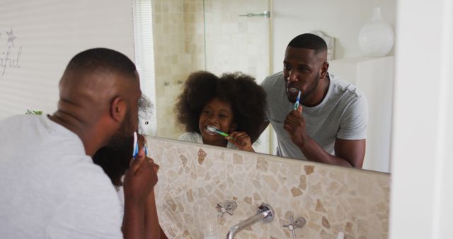 Happy Father and Daughter Brushing Teeth Together in Bathroom Mirror - Download Free Stock Images Pikwizard.com