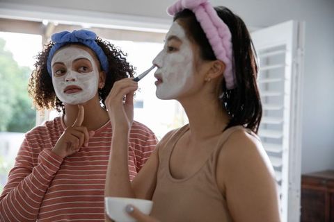 Diverse Women Applying Face Masks for Skincare Routine