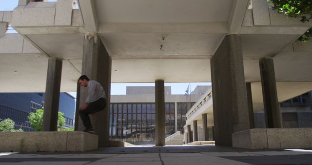 Man Practicing Parkour in Modern Urban Landscape - Download Free Stock Images Pikwizard.com
