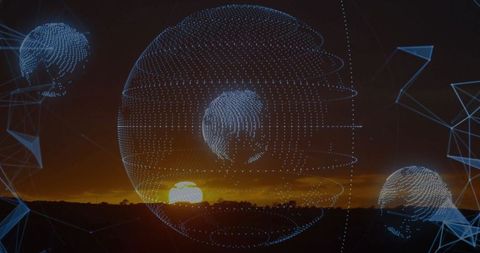 Wireframe Globes Hovering Over Landscapes at Sunset