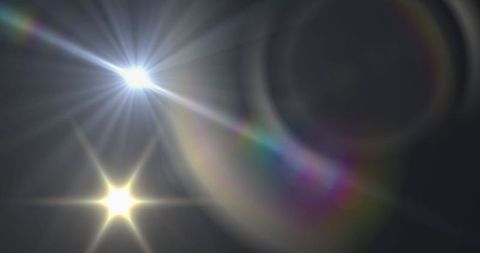 Colorful Light Flares with Multicolored Halo on Black Background - Download Free Stock Images Pikwizard.com
