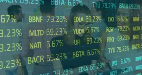 Team Analyzing Financial Data on Interactive Digital Screen