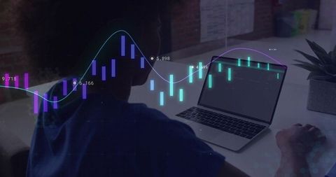Professional Woman Analyzing Data Charts on Laptop at Minimalist Workspace