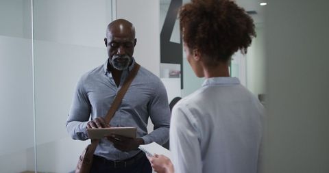 Business Colleagues Collaborating in Modern Office with Digital Tablet