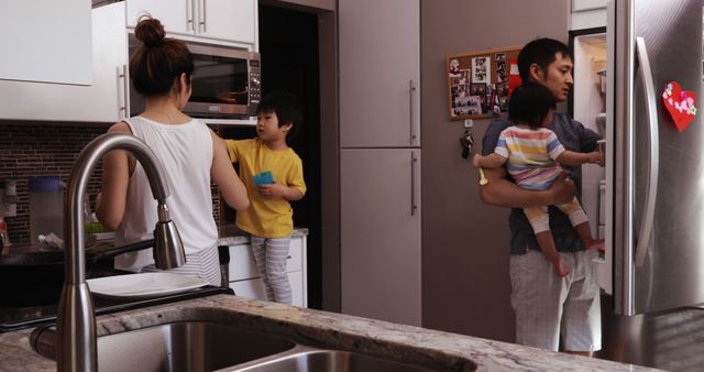 Family Preparing Dinner in Modern Kitchen - Download Free Stock Images Pikwizard.com