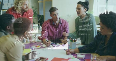 Dynamic Team Collaborating on Project with Data Analysis Visuals