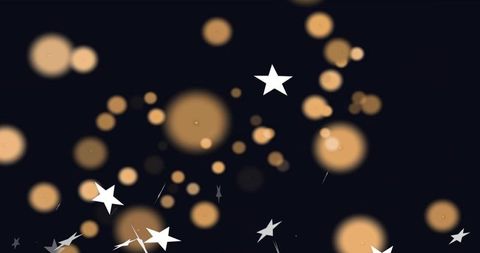 Glowing golden bokeh with floating white stars on deep navy background for festive design