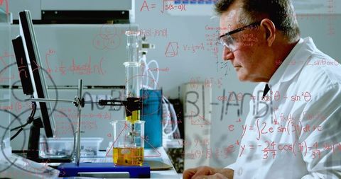 Senior Chemist Analyzing Separation Apparatus with Digital Readout in Modern Laboratory