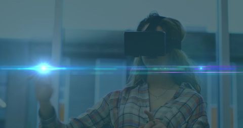 Woman Exploring Virtual Reality in Office Environment
