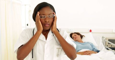 Stressful Day in Hospital Ward for Nurse Caring for Patient