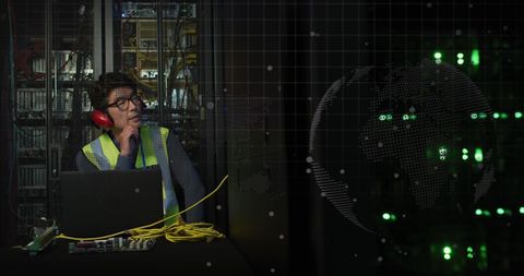 Technician Monitoring Global Data in Server Room - Download Free Stock Images Pikwizard.com