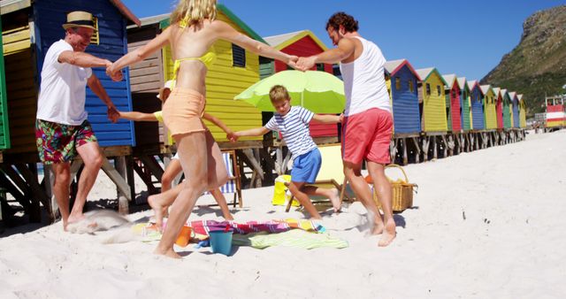 Cheerful Family Holding Hands and Playing at Beach - Download Free Stock Images Pikwizard.com