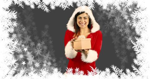Smiling Woman in Santa Costume Holding Christmas Gift With Snowflake Frame