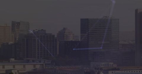 Glowing Network Connections in Urban Skyline at Dusk