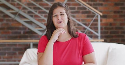 Woman Relaxing on Couch, Modern Loft Style, Bright Emphasis