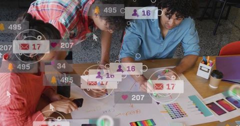 Team Designing Innovative App Interface at Colorful Workspace