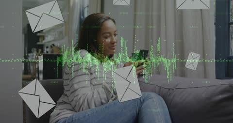 Woman on Couch Using Smartphone with Email Graphics