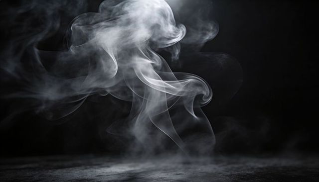 Rising curling gray smoke plume over dark textured floor with soft top light halo ethereal