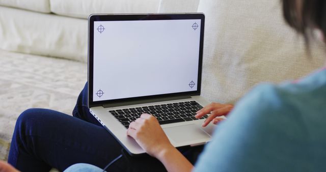 Person Using Laptop with Blank Screen Working from Home - Download Free Stock Images Pikwizard.com