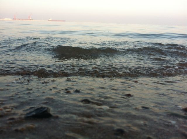Calm Ocean Waves on Sandy Beach at Sunrise - Download Free Stock Photos Pikwizard.com