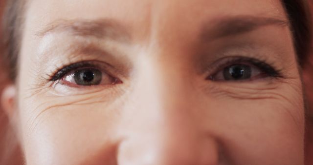 Close-Up of Mature Woman's Eyes and Wrinkles Highlighting Authentic Aging - Download Free Stock Images Pikwizard.com