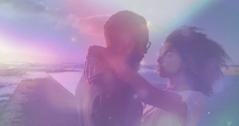 Romantic Diverse Couple Embracing in Dreamy Seaside Atmosphere