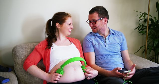 Couple Sharing Joyful Moment Connecting with Expected Baby - Download Free Stock Images Pikwizard.com