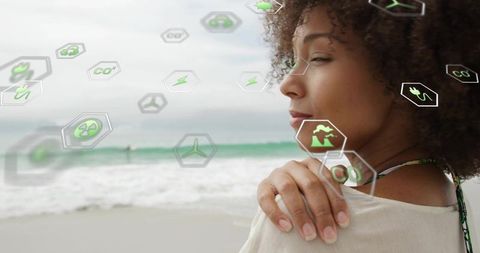 Woman on Beach with Eco-Friendly Tech Concepts Overlay